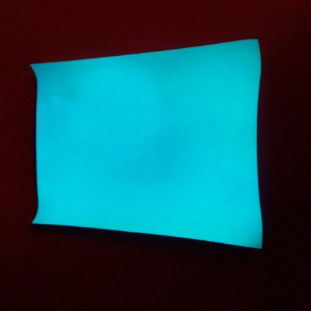 Charged Atomic Glow in Blue